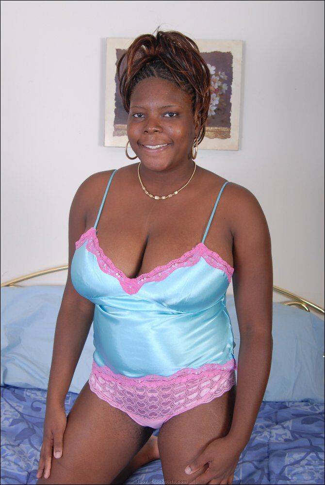 Black plumper frees her big natural tits from satin lingerie as she gets naked - #1