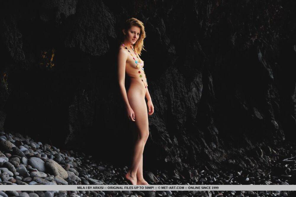 Naked teen Mila I strikes great solo poses while on seaside rocks - #2