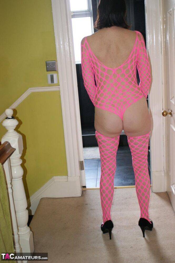 Older amateur Slut Scot Susan dildos her cunt while wearing pink mesh attire - #10