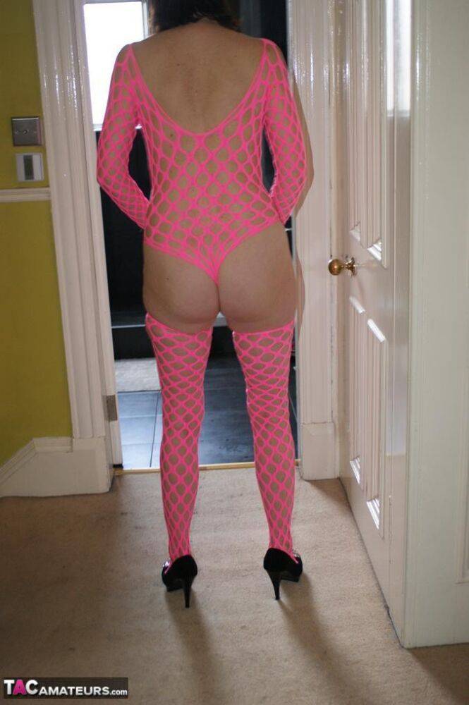 Older amateur Slut Scot Susan dildos her cunt while wearing pink mesh attire - #8