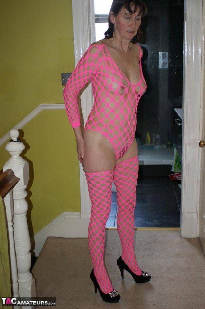 Older amateur Slut Scot Susan dildos her cunt while wearing pink mesh attire - #13