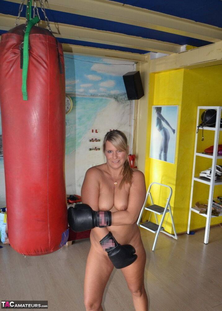 Middle-aged blonde Sweet Susi gets naked after working out with a punching bag - #2