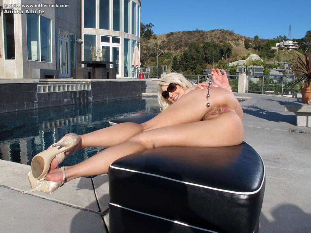Blonde in tiny golden bikini Anikka Albrite toys and dildos her holes outdoors - #15