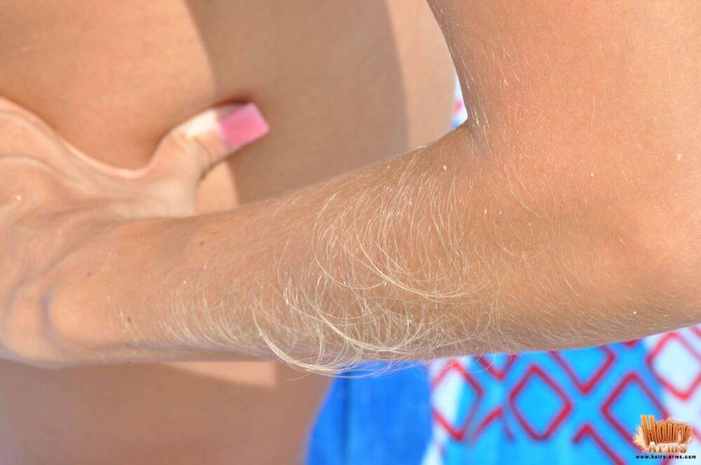 Amateur model Lori Anderson shows her hairy arms during a series of closeups - #1