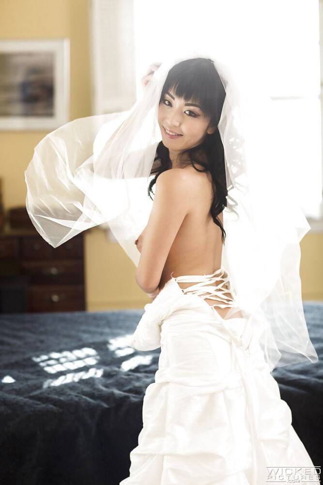 Sexy Asian bride Marica Hase removing wedding dress for nude photo spread - #11