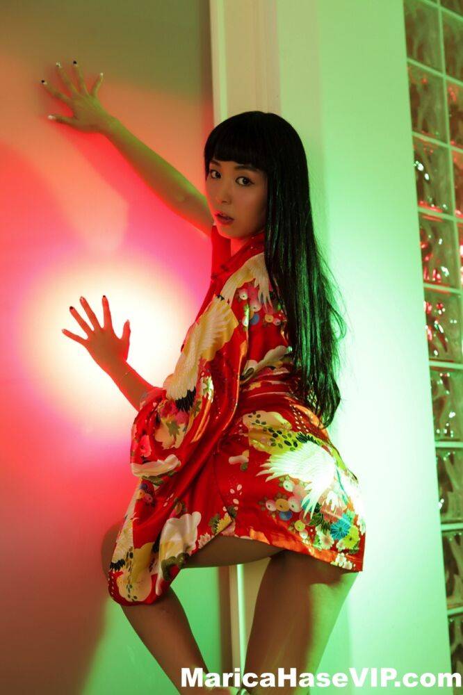 Japanese beauty Marica Hase works free of an Oriental robe for hot nude poses - #10