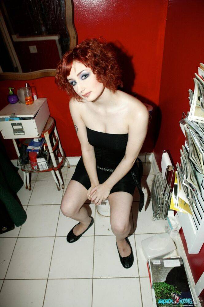 Pale redhead Violet Monroe gets naked in flat shoes while in a bathroom - #15