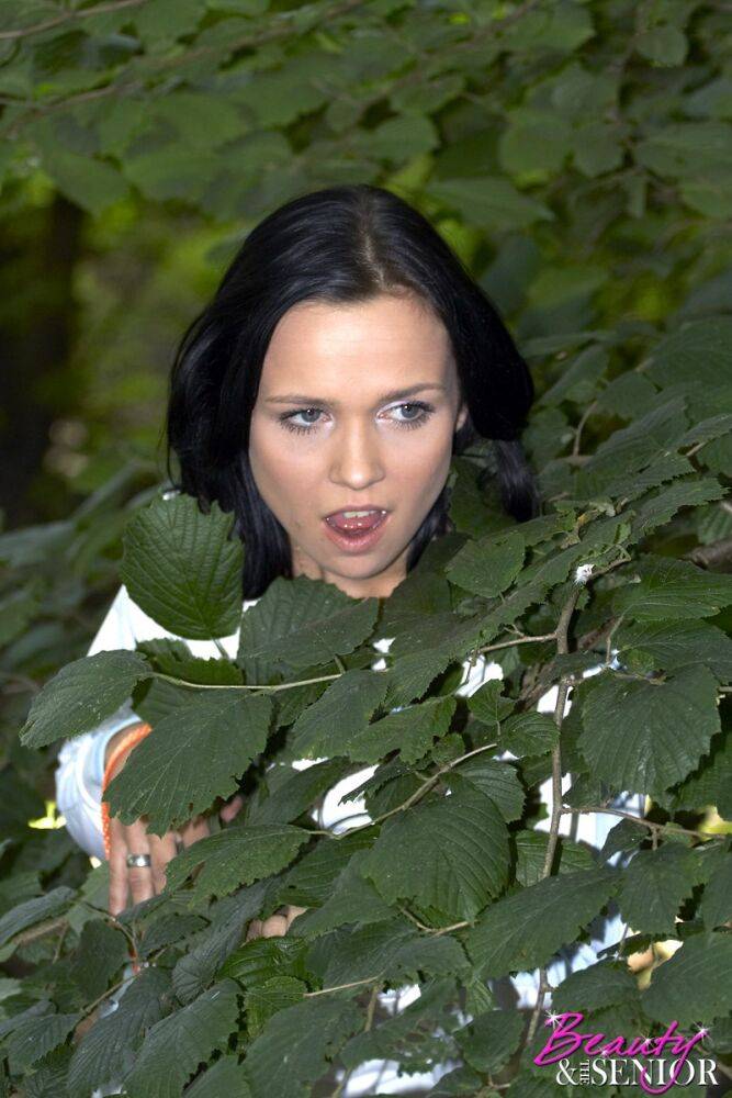 Dark haired young girl seduces an old man on a hunting trip in the woods - #11