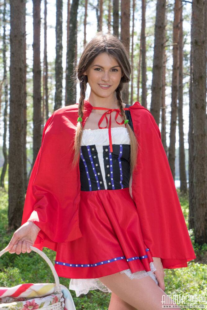 Teen amateur removes a Little Red Riding Hood outfit to get naked in the woods - #1