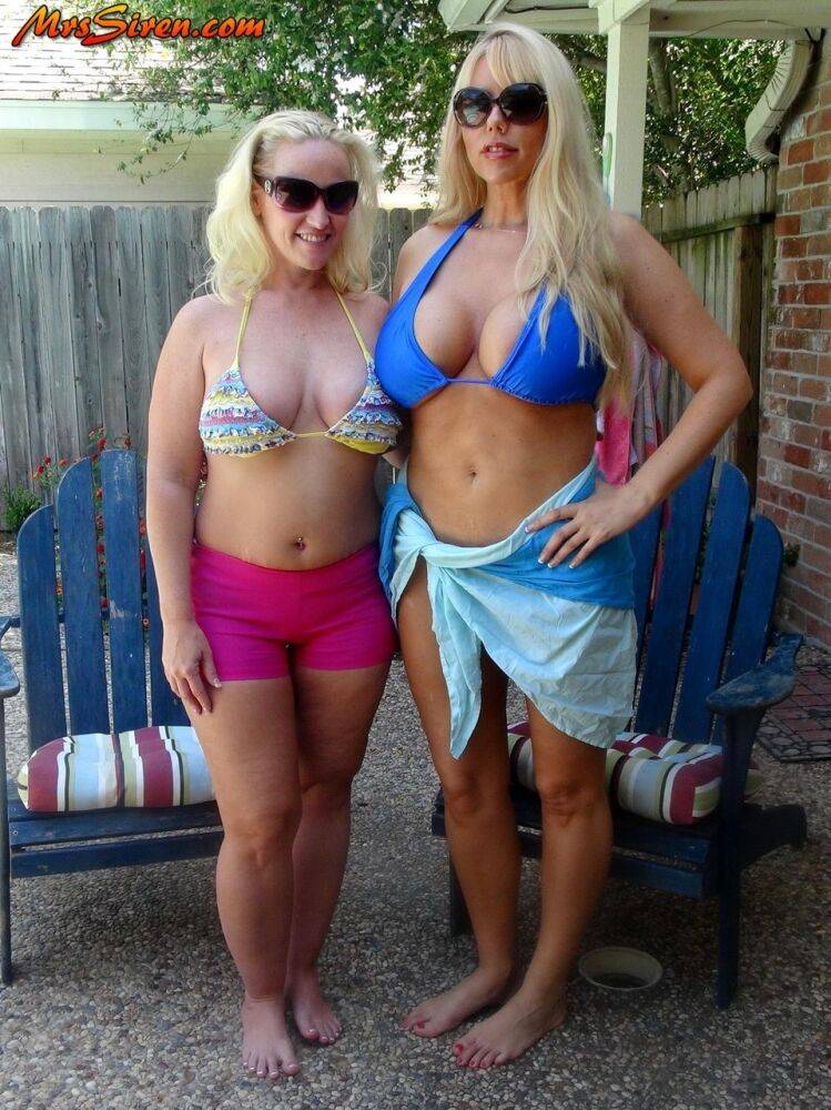 Blonde women Karen Fisher and Dee Siren loose their big tits from bikini tops - #6