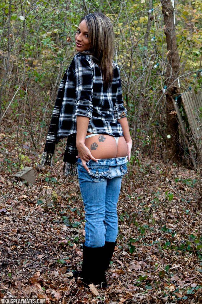 Solo girl Nikki Sims strips to a long scarf and her boots out in the woods - #13