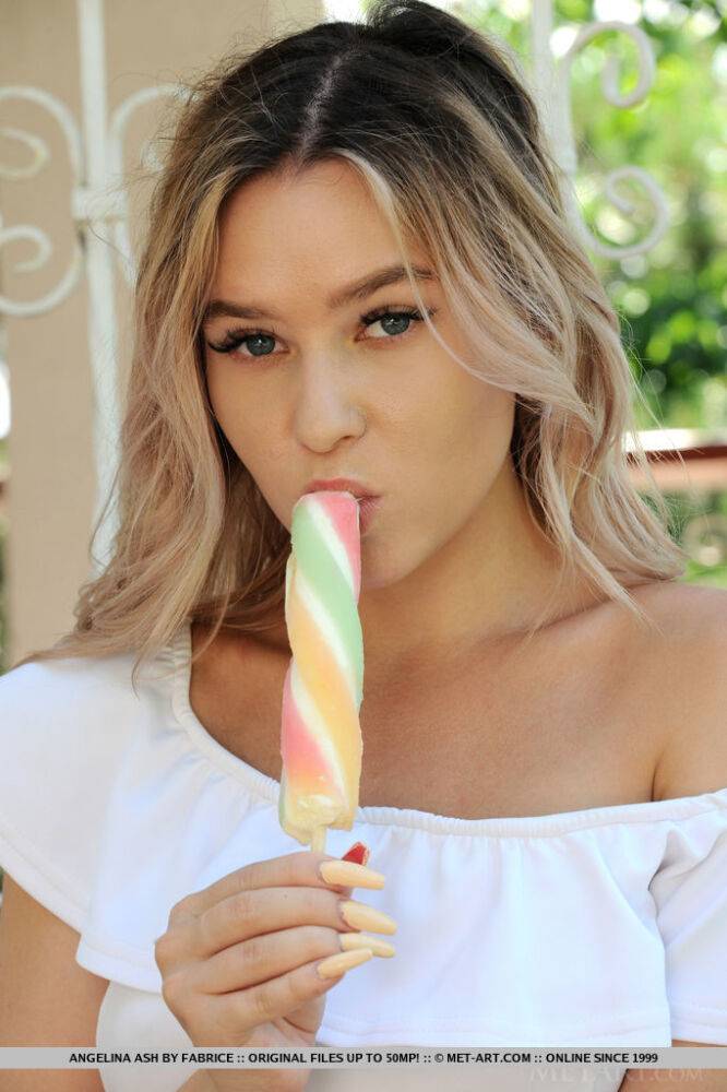 Dirty blonde teen Angelina Ash eats a frozen treat while getting totally naked - #2