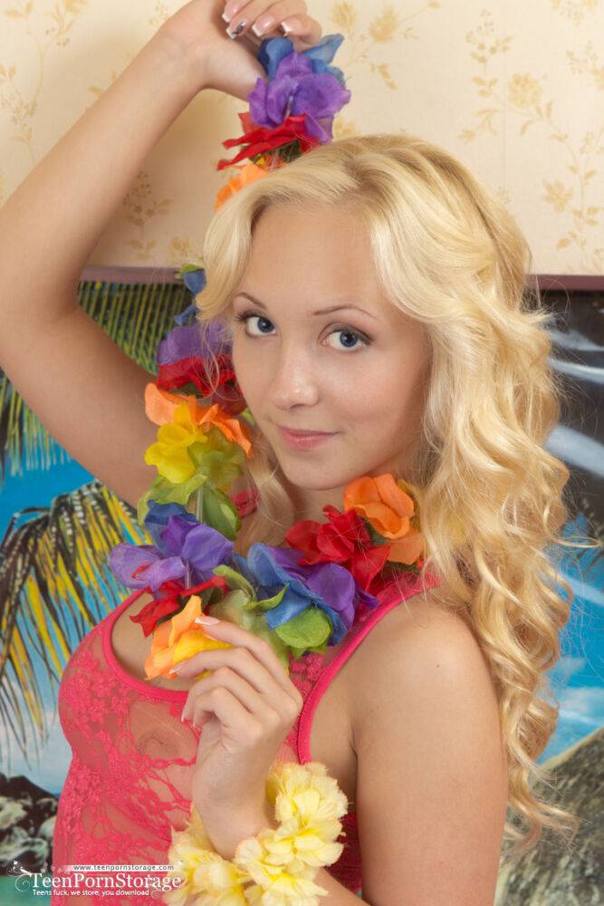 Young blonde girl Linet gets naked after attending a luau - #7