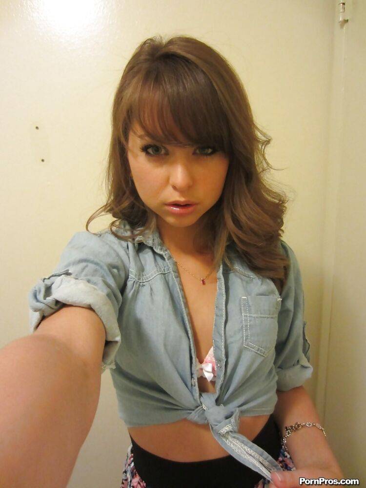 Clothed teen Riley Reid does some sexy self shots while in a toilet - #15