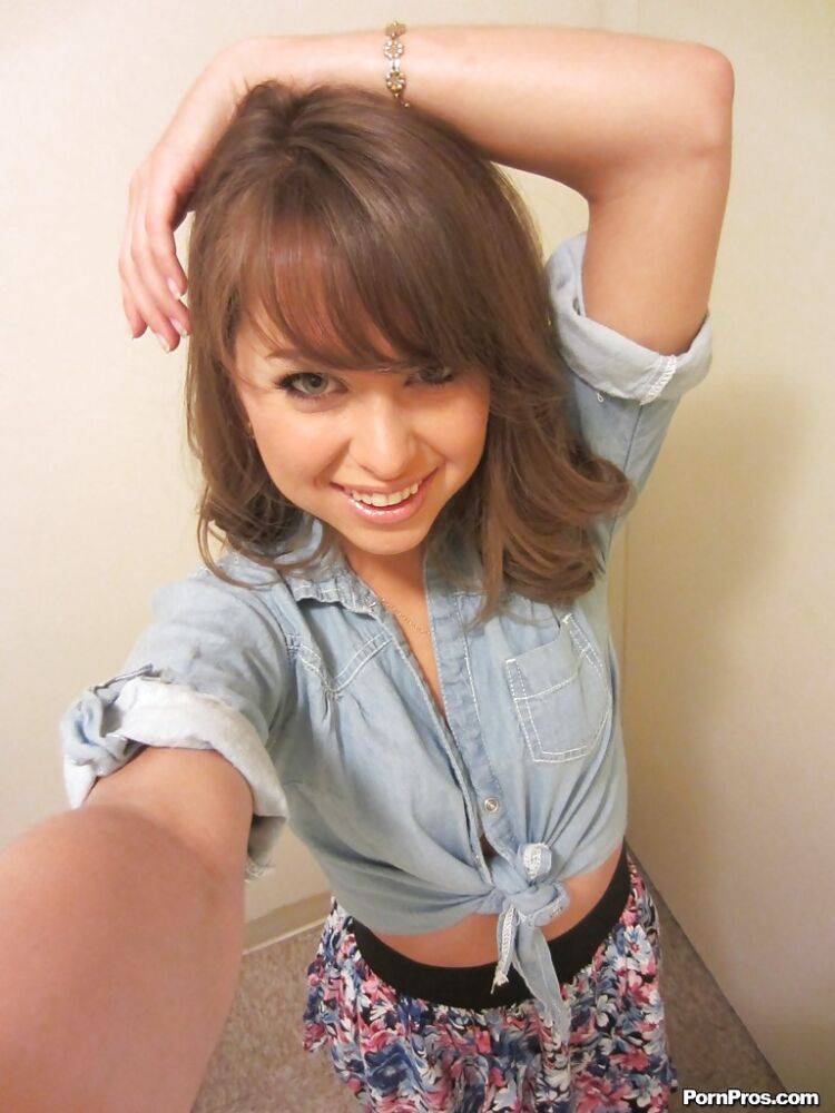 Clothed teen Riley Reid does some sexy self shots while in a toilet - #9