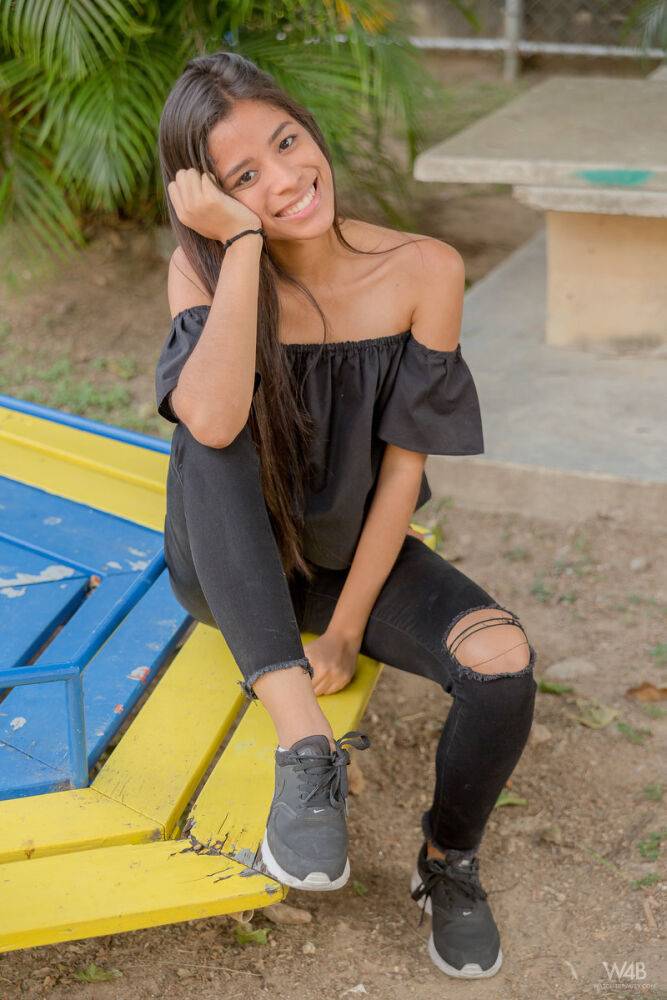 Smiley hot glamour girl Karin Torres looking sexy in ripped jeans on a swing - #3