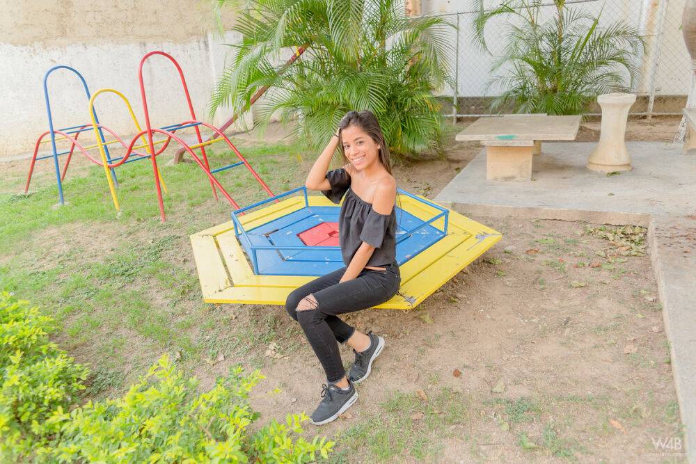 Smiley hot glamour girl Karin Torres looking sexy in ripped jeans on a swing - #9