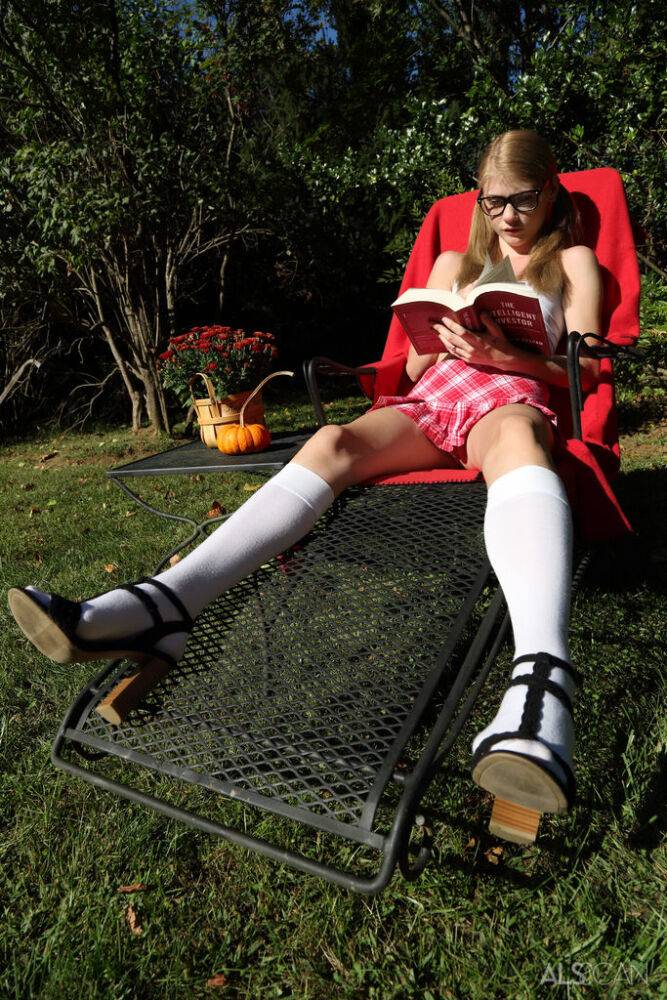 Kinky nerd Hannah Hays works a massive dildo into her twat in the yard - #8