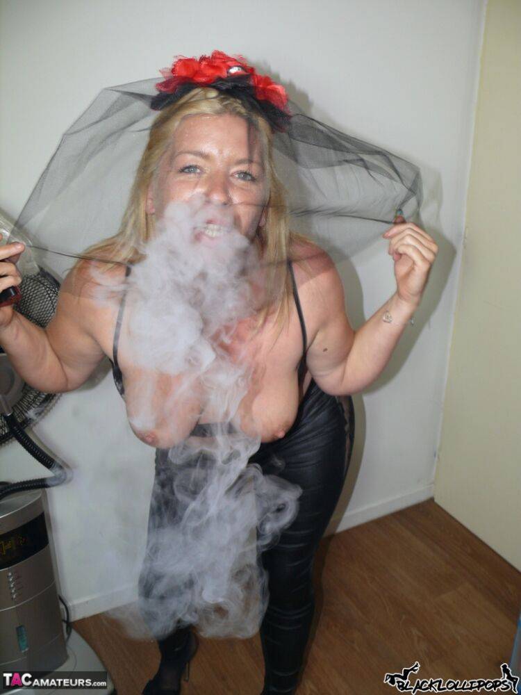 Blonde chick Black Lollipops hits a vaporizer while wearing a veil and nylons - #2