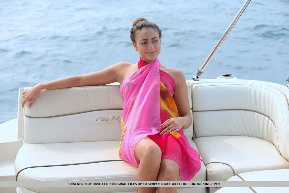 Teen solo girl Cira Nerri proudly shows her tiny tits and tight slit on a boat - #8