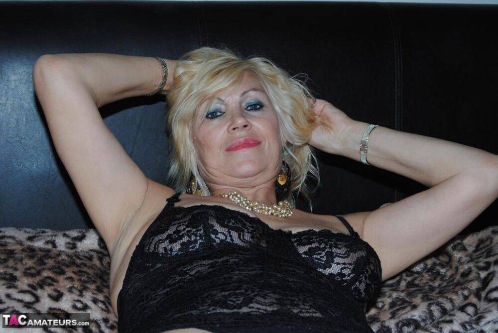 Hot mature beauty Platinum Blonde models her big saggy tits in lace lingerie - #9