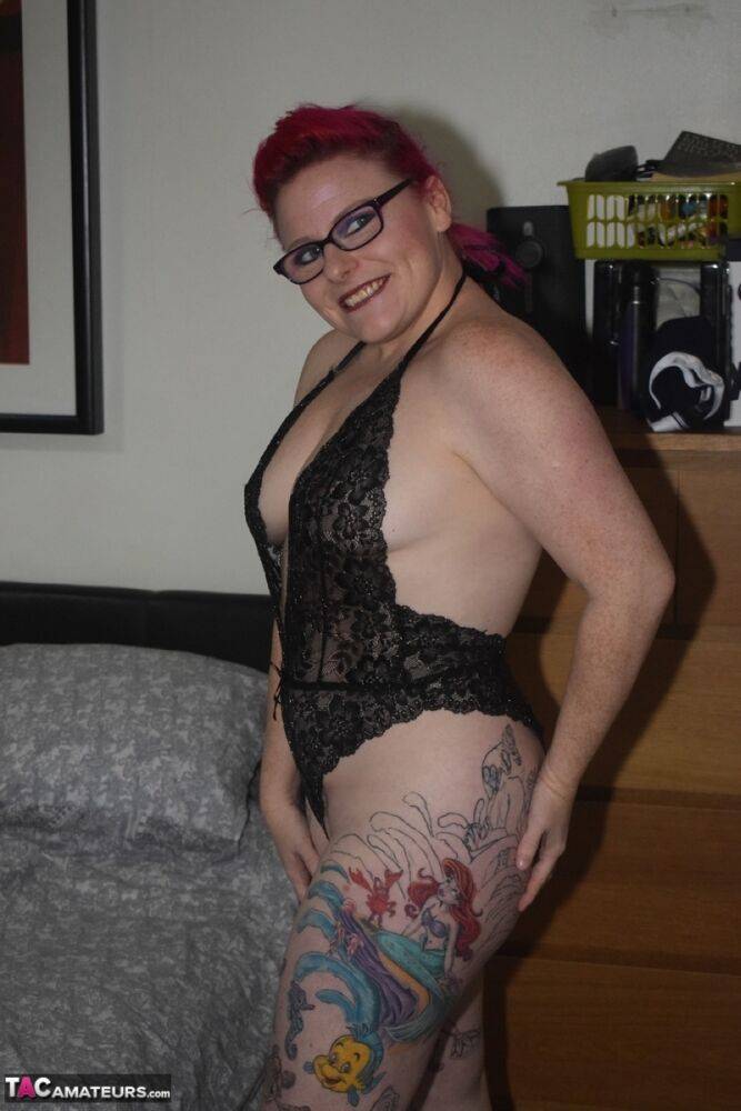 Tattooed amateur Mollie Foxxx models black lingerie with her glasses on | Photo: 2652850