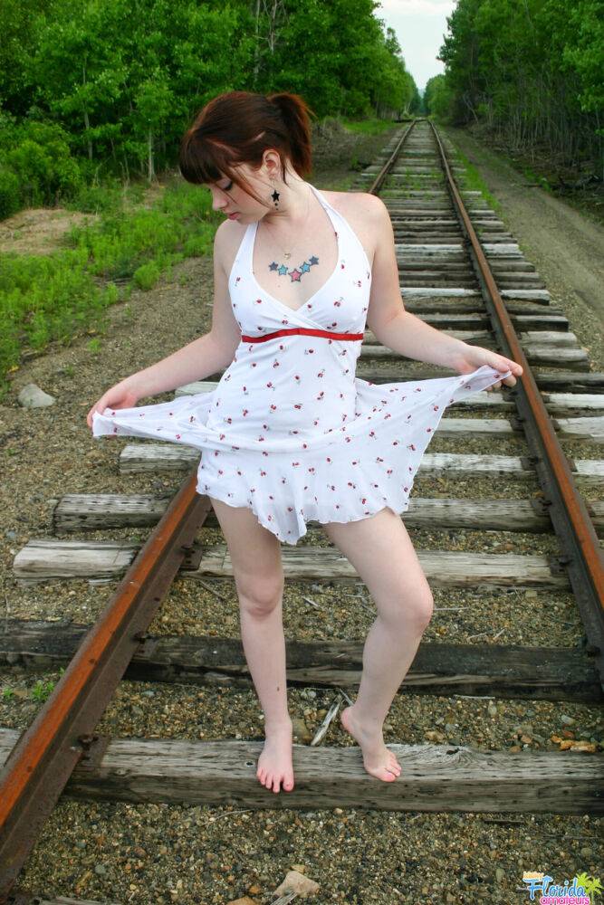 Redheaded girl Barbie A models a summer dress in bare feet on railway tracks - #4