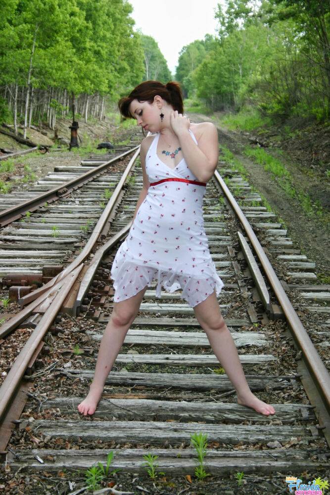 Redheaded girl Barbie A models a summer dress in bare feet on railway tracks - #3