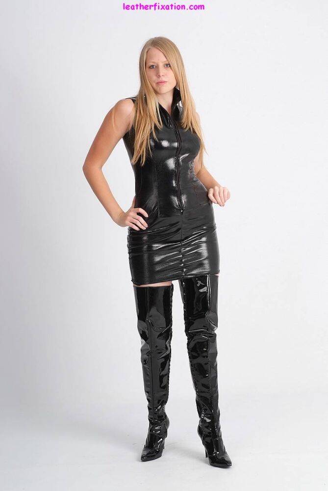 Blonde chick Hayley models non nude in a leather dress and thigh high boots - #4