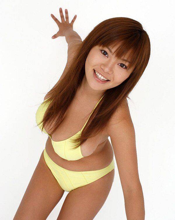 Pretty Japanese redhead Yoko Matsugane models a yellow bikini in bare feet - #14