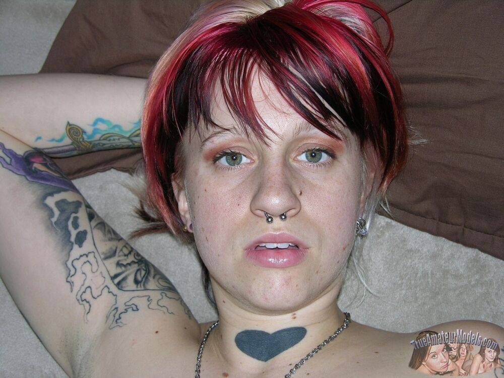 Amateur girl with piercings and dyed hair shows her natural pussy on love seat - #7