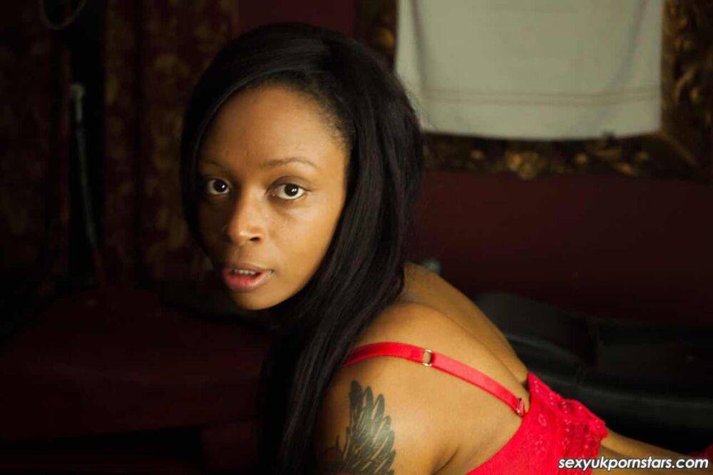 British black girl Lola Marie models red lingerie and matching stockings - #6