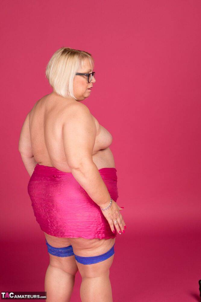 Blonde fatty Lexie Cummings models topless in glasses and stockings - #14
