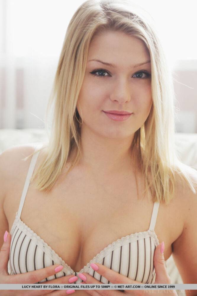 Beautiful blonde teen Lucy Heart puts her smooth pussy on display - #14