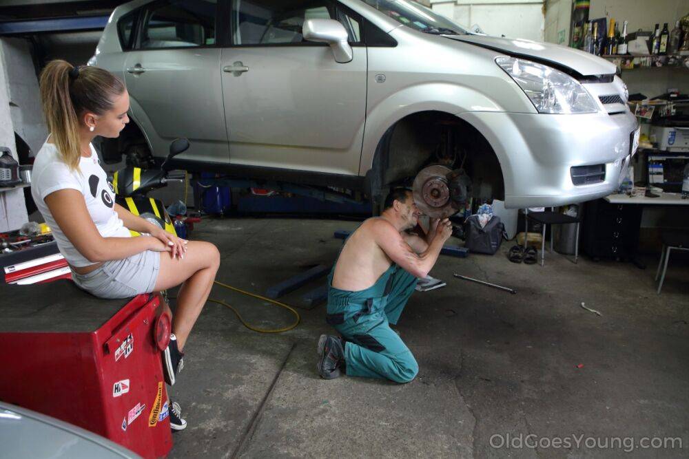 Horny teen Naomi Bennet seduces an old mechanic while he works on her car - #7