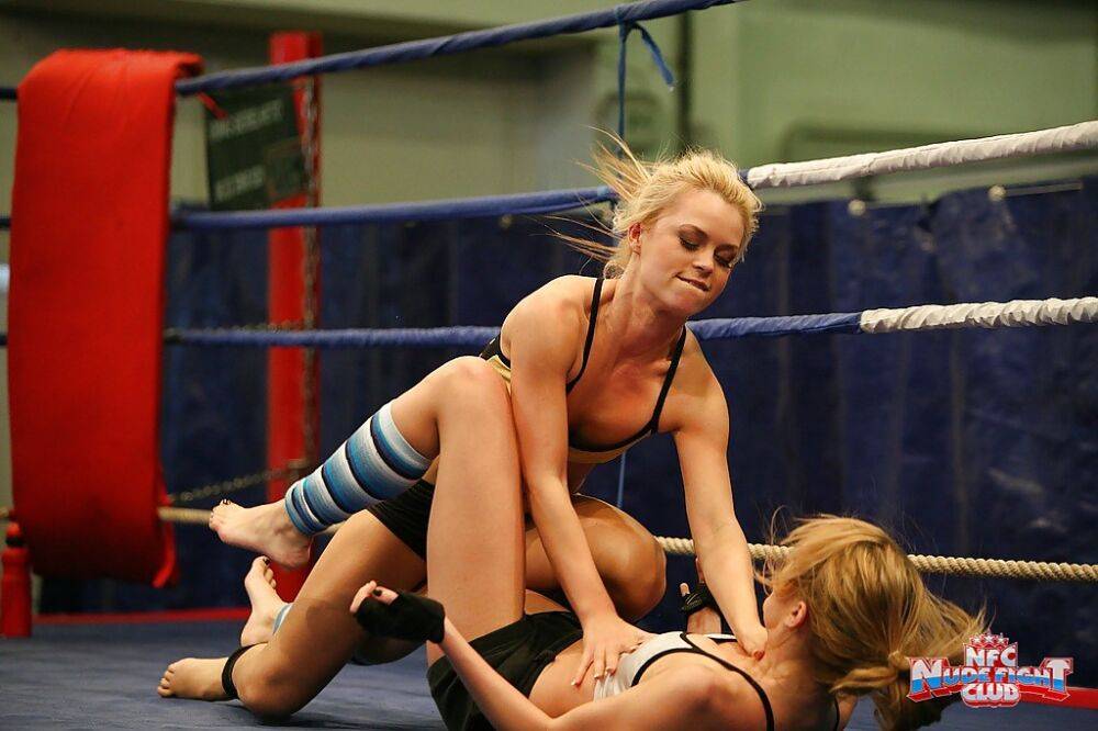 Pretty lesbians gasping and stripping each other in the wrestling ring - #13