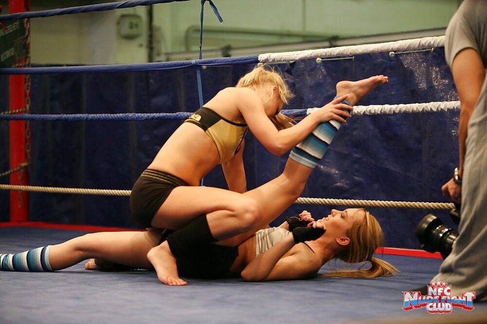 Pretty lesbians gasping and stripping each other in the wrestling ring - #11