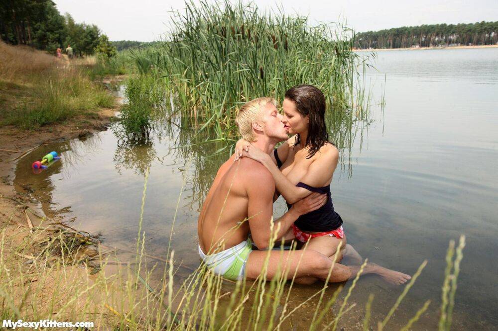 Busty teen and her boyfriend come ashore to continue the fuck fest at the lake - #14
