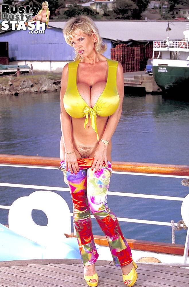 Older woman Busty Dusty loosing massive hooters outdoors on dock - #9