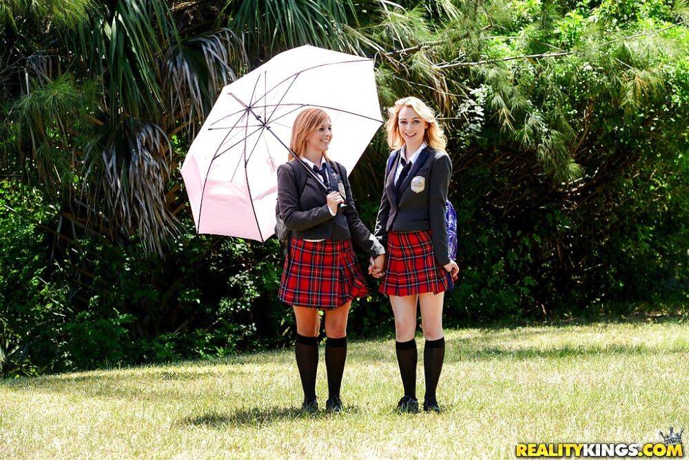 Young schoolgirls Cali Sparks and Kelly Greene tongue kissing outdoors - #16