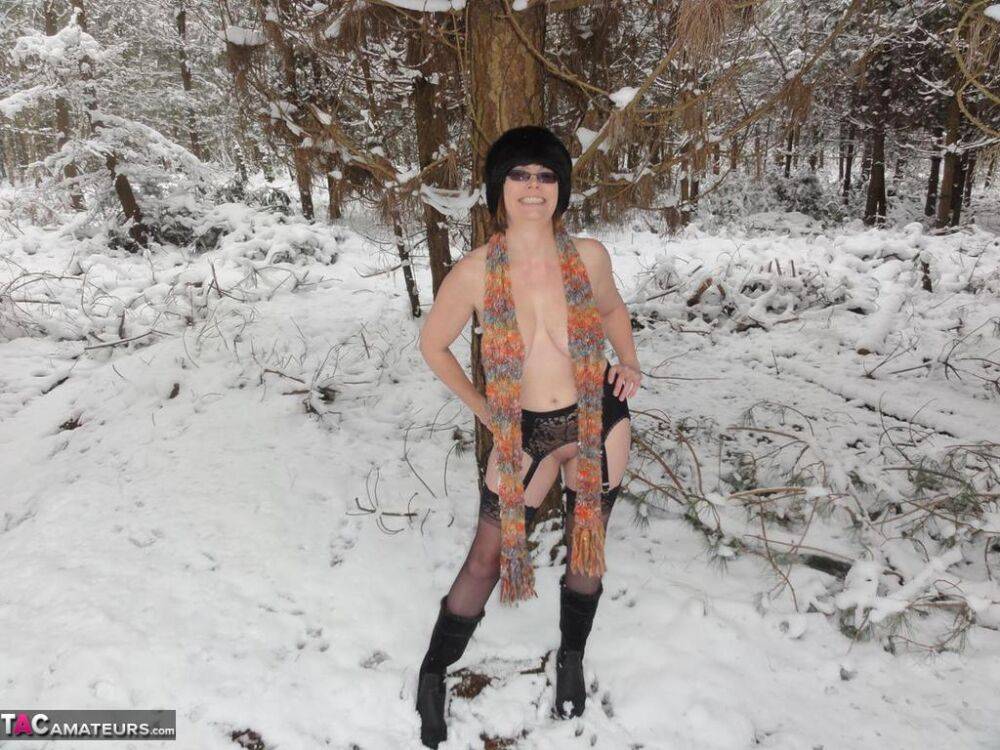 Older amateur Barby Slut exposes herself on snow-covered ground - #6