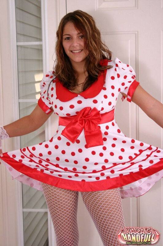 Cute teen Kara exposes white underwear in fishnets and a polka-dot dress - #1
