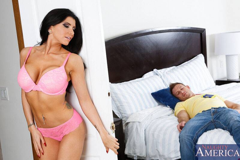 Dark haired woman Romi Rain seduces a sleeping man in a pink bra and panty set - #8