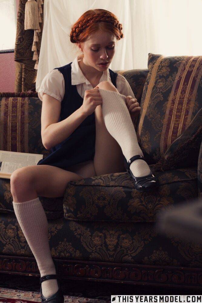 Young looking redhead Dolly Little gets naked in white socks and Mary Jane's - #2