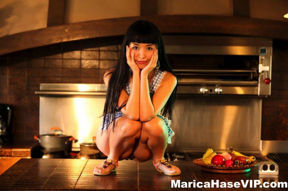 Japanese housewife Marica Hase releases her tits and twat from an apron - #7