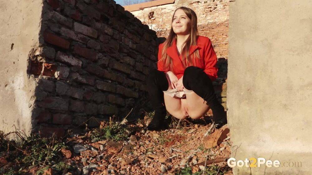 Caucasian girl Nastya takes a piss behind the remnants of a brick house - #15