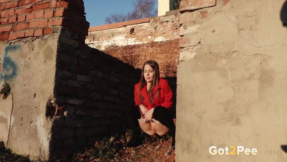 Caucasian girl Nastya takes a piss behind the remnants of a brick house - #11