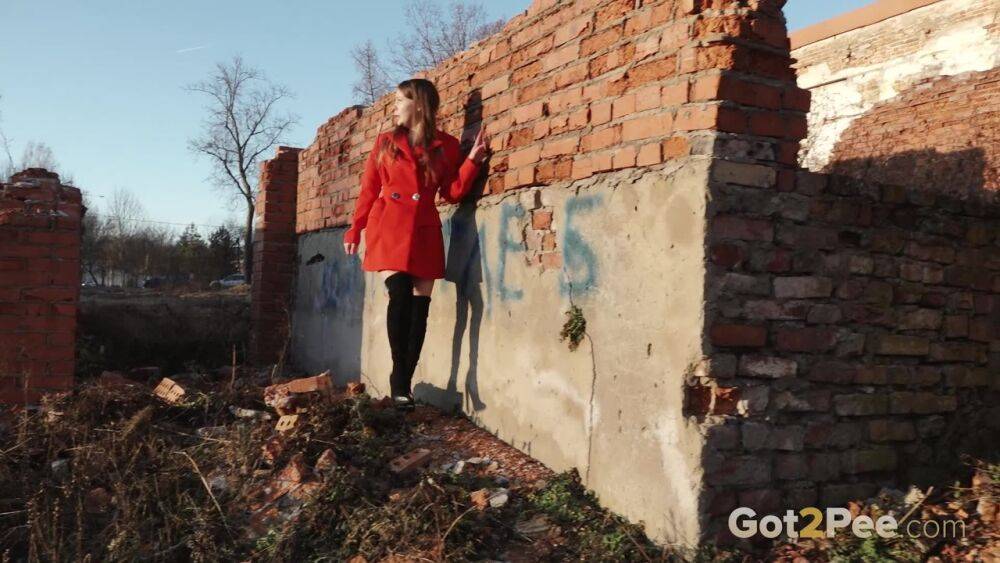 Caucasian girl Nastya takes a piss behind the remnants of a brick house - #8
