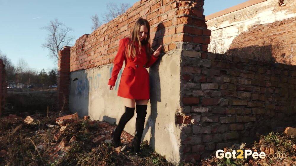 Caucasian girl Nastya takes a piss behind the remnants of a brick house - #2
