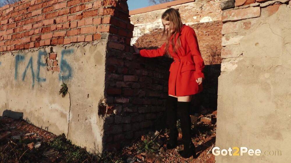 Caucasian girl Nastya takes a piss behind the remnants of a brick house - #14